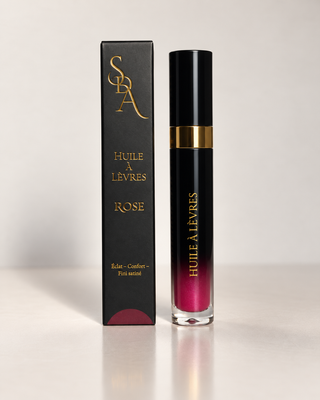 Huile à lèvres Secrets d'Autrefois teinte Rose, flacon noir et or avec son étui